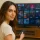 Watch with IPTV Smarters Pro – Premium IPTV Player & Subscription 2025 Woman watching TV using IPTV Smarters Pro app on Smart TV – best IPTV Smarters Player subscription in 2025 , iptv free trial.